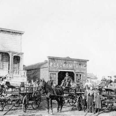 Blacksmith shop with wagons