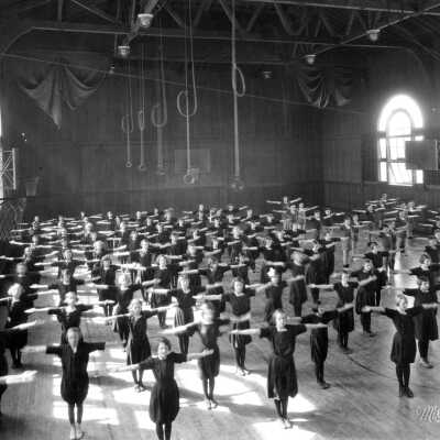 Willard School Women student exercising in gymnasium,