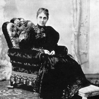 Phoebe Hearst sitting in chair