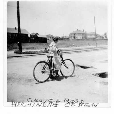 Hermineme Ogden on bicycle