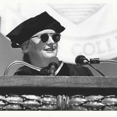 2011.060.440b: Jeff Lindquist, photog. Speaking at Mills Collège commencement. 1994.