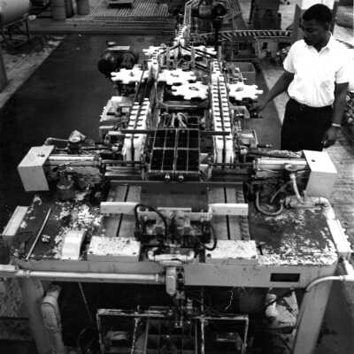 Worker at machinery