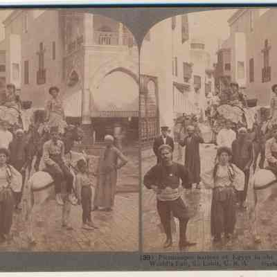 Picturesque natives of Egypt in crooked streets of "Cairo" at the World's Fair, St. Louis, U.S.A.
