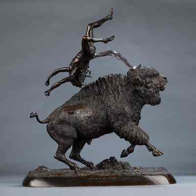 Buffalo Throwing the Hunter