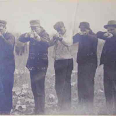 Five Men Aiming at the Camera