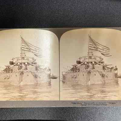 "Old Glory" flies proudly on the noble "Oregon"