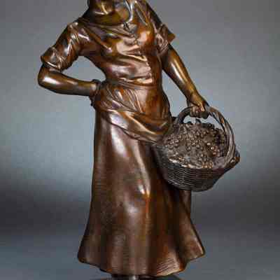 Woman with Basket of Grapes