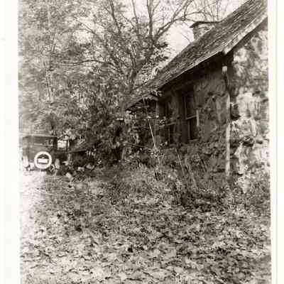 Bailiwick [rear of building w/automobile]