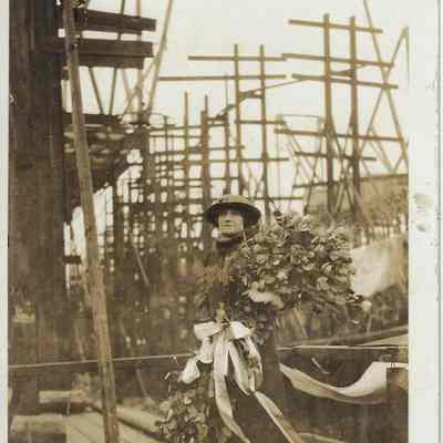 Mrs. Martin Vogel with Bouquet of Flowers at the Chappaqua Christening