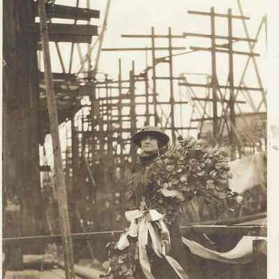 Mrs. Martin Vogel with Bouquet of Flowers at the Chappaqua Christening