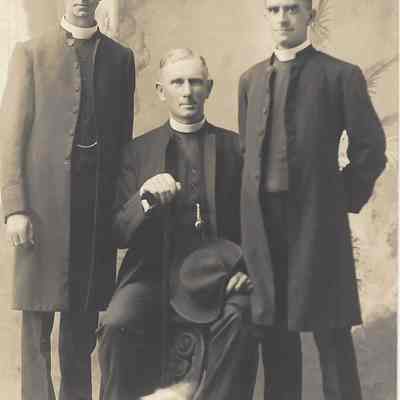 Three men and a Dog