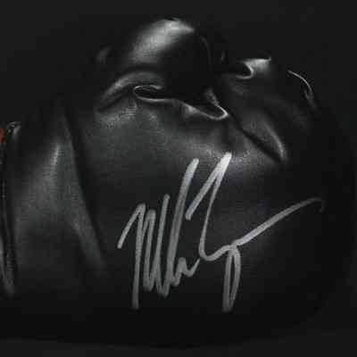 Mike Tyson Signed Boxing Glove (GA COA)