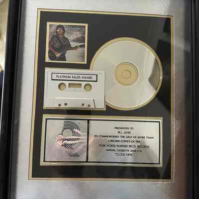 GEORGE HARRISON "PLATINUM" RECORD AWARD