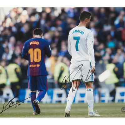 LIONEL MESSI AND CRISTIANO RONALDO: SIGNED PHOTO PRINT (BECKETT)