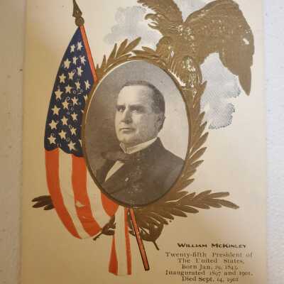 McKinley Postcard with gold eagle, olive branches, and flag