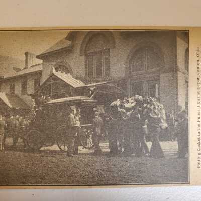 Putting Casket in the Funeral Car at Depot, Canton, Ohio Postcard