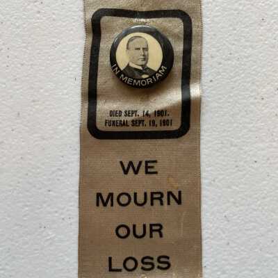 We Mourn Our Loss Ribbon and Pin
