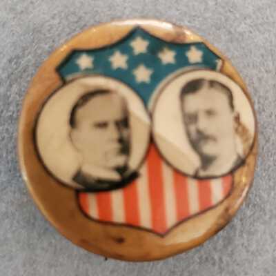 McKinley and Roosevelt pin with shield background and image offset to left