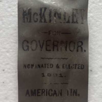American Tin Badge