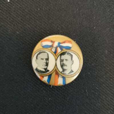 McKinley and Roosevelt pin gold background with red/white/blue bow