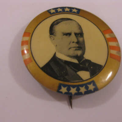 Large gold, red, white and blue McKinley pin.