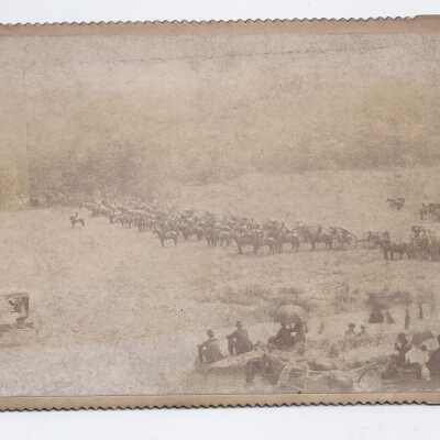 Cavalry gathering in an unknown field.