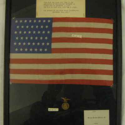 Flag and badge from dedication of the National McKinley Memorial Canton, Ohio