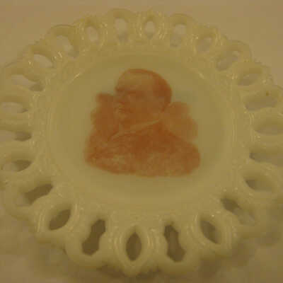 Small white plate with McKinley Portrait and decorative border