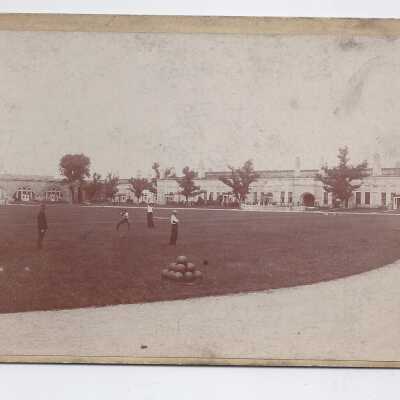 Men playing ball at an unknown location