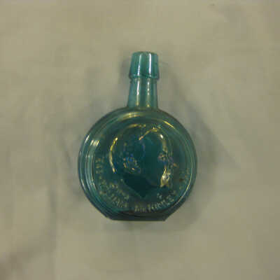 Blue bottle with McKinley profile.