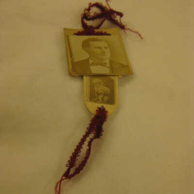 Maroon ribbon with sepia image of William Jennings Bryan and an image of a child