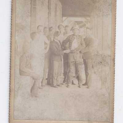 Unknown group on a porch.