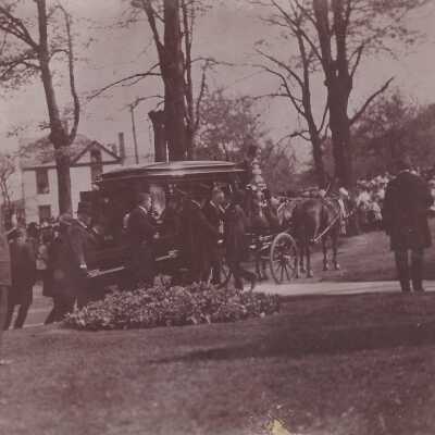 McKinley's casket taken away from hearse.