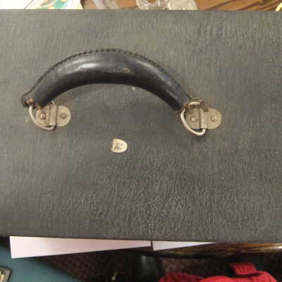 Two-piece latched black case.