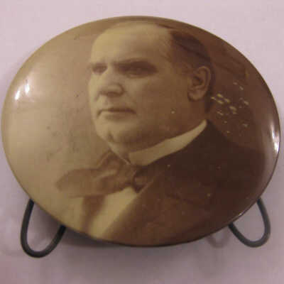 Sepia portrait of McKinley with small stand