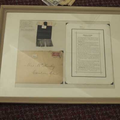 Display of Resolutions of Respect by the American Citizens of Santiago de Cuba, Envelope, and Ribbon used in Presidential Funeral Carriage at Canton, Ohio September 19, 1901.
