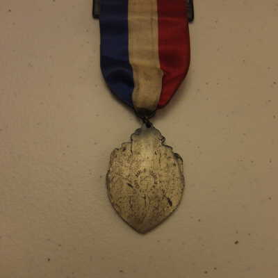 D. of U. V., 61st Encampment badge, 1927.