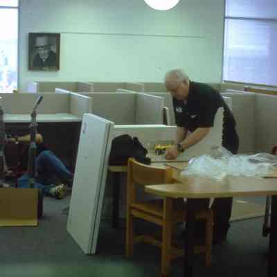 1/14/03, Emmons office products workers setting up computer cubicles in C.M. White library