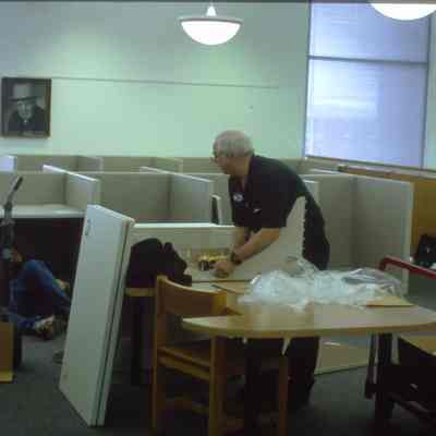 1/14/03, Emmons office products workers setting up computer cubicles in C.M. White library