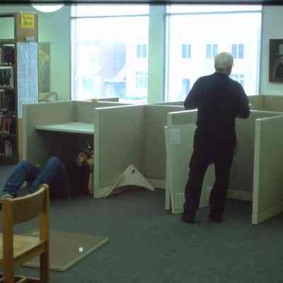 1/14/03, Emmons office products workers setting up computer cubicles in C.M. White library