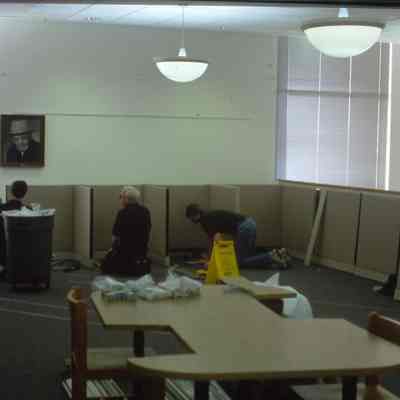 1/14/03, Emmons office products workers setting up computer cubicles in C.M. White library