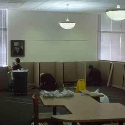 1/14/03, Emmons office products workers setting up computer cubicles in C.M. White library