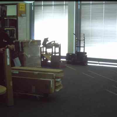 1/14/03, Emmons office products workers setting up computer cubicles in C.M. White library