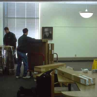 1/14/03, Emmons office products workers setting up computer cubicles in C.M. White library