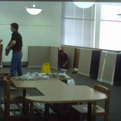1/14/03, Emmons office products workers setting up computer cubicles in C.M. White library