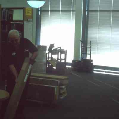 1/14/03, Emmons office workers setting up computer cubicles in C.M. White library