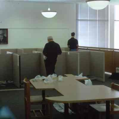 1/14/03, Emmons office products workers setting up computer cubicles in C.M. White library