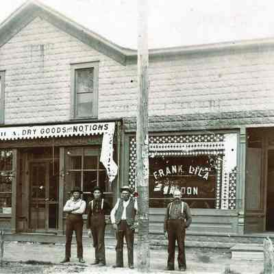 Outside Lila Saloon, unknown, Felix, unknown, Frank