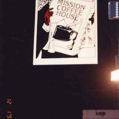 The Mission Coffee House street sign during the night