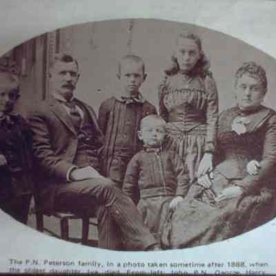 P.N. Peterson Family, Amherst, Wisconsin. Left to right: John, P.N., George, Harry, Esther, Annice (Mrs. P.N.), Raymond